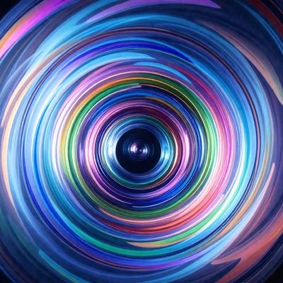 The primary subject of the image is a colorful, swirling pattern that appears to be a digital art or illustration. The setting is a black background, which contrasts with the vibrant colors of the swirling pattern. The visual style is a mix of photo and digital art, creating a unique and eye-catching effect. The dominant colors in the image are blue, purple, and orange, which contribute to a lively and energetic atmosphere.